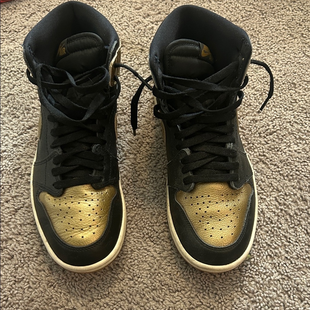Jordan Black and Gold Sneakers